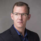 Dr. Travis L. Scholten